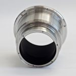 shiny metallic component coated with vacuum black coating