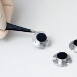 3 tiny components coated with vacuum black coating